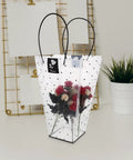 Clear Plastic Flower Packaging Bags With Handle For Bouquets, Easy To Carry Floral Wrapping For Weddings And Valentine Gifts in use.