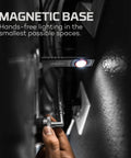 Slim Mini Rechargeable Pocket Light For EDC And Emergencies attached magnetically to a metal surface in a dark space.