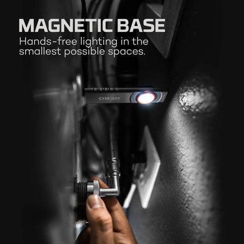 Slim Mini Rechargeable Pocket Light For EDC And Emergencies attached magnetically to a metal surface in a dark space.