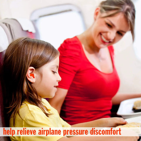 Child wearing Soft Moldable Silicone Ear Plugs For Kids Size Small Pack Of Six in airplane, shown with parent