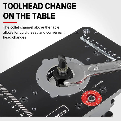 Heavy Duty Aluminum Killer Precision Router Lift System With Dead Tight Height Adjustments Down To One Sixty Fourth Inch For No Slope Woodworking Inserts toolhead change mechanism with wrenches on the table.