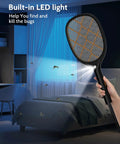 Electric Fly Swatter Zapper Racket 4000V Beast Mosquito Killer With LED Light in use indoors, illuminating a dark room.