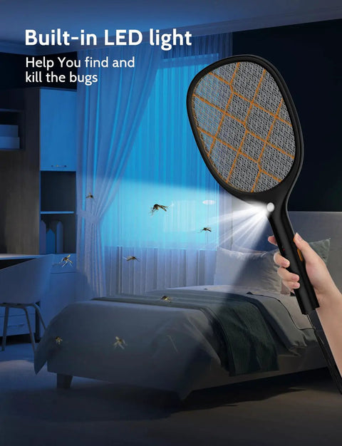 Electric Fly Swatter Zapper Racket 4000V Beast Mosquito Killer With LED Light in use indoors, illuminating a dark room.