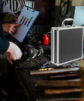 Premium Aluminum Tool Box Featuring Heavy Duty Build And Secure Snap Lock Cover For Van Life Adventures Job Site Projects Weekend Warrior Gear Compact Alloy Storage Case on a workbench.