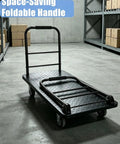 Built Tough Heavy Duty Steel Platform Truck With 2700 Lb Capacity 48 By 24 Inch Industrial Flatbed Cart Alloy Steel Frame Collapsible Handle 360 Degree Swivel Casters Made For Workshop Backyard And Heavy Cargo Logistics folded handle in warehouse