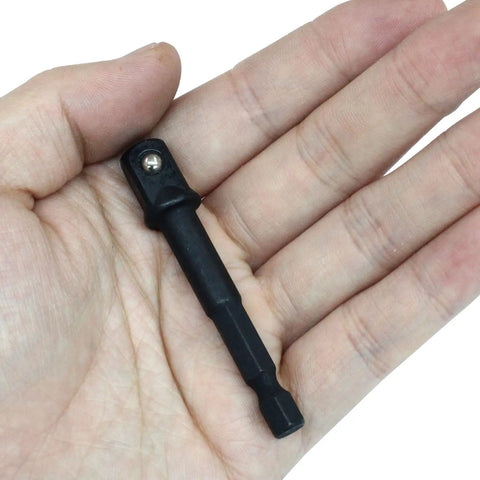 Person holding Impact Socket Adapter Set Quarter Inch To Three Eighths Inch Square Drive Built For Impact Driver DIY Automotive Projects