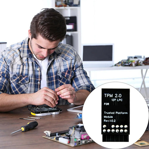 TPM 2.0 Security Module With 12 Pin LPC Interface for Easy Motherboard Integration and Quick Plug and Play Setup in technician's hands.