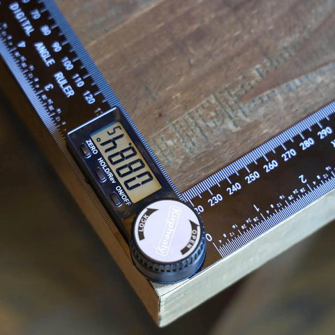 Digital Angle Finder Protractor 7 Inch 200mm Angle Gauge for carpentry on wood surface with LCD showing angle measurement