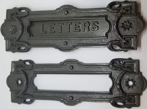Neo Classical Cast Iron Mailbox With Swinging Letter Slot Door Wall Mounted Vintage Antique Postal Box Old School Charm, Ornate Garlands And Floral Accents, Reproduction Of 1900 Original With Weathered Iron Finish; close-up of letter slot design