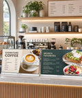 23.8 Inch Digital Menu Board With USB Loop Playback, Countertop Restaurant Display showing coffee and brunch menu at a cafe.