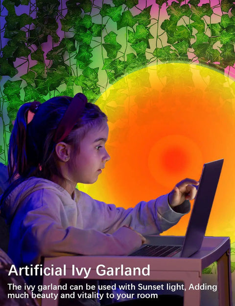 Child using laptop with Sunset Projection Lamp With 64 Color Options, App Controlled Ambient Light With Ivy Leaves background