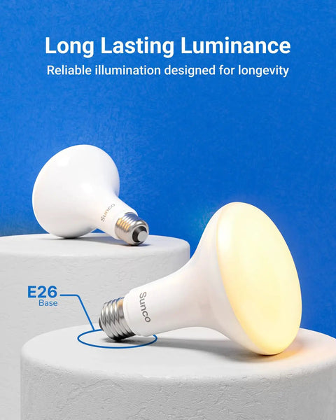 12 Pack BR30 LED Bulbs For Recessed Can Lights, E26 base, warm white glow on pedestal, showcasing bulb design and base type.