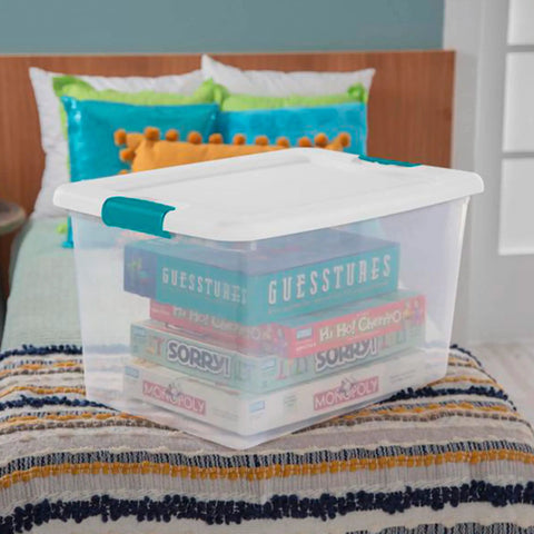 Super Tight Fit 64 Quart Clear Plastic Storage Bins 72 Pack With Snappy Hinged Lids on bed storing board games.