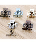 6 Pack Galvanized Double Ball Roller Cabinet Catch in various finishes on wood surface