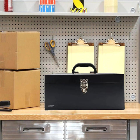 Black 16 inch portable metal toolbox built to last, 18 gauge steel with locking latch, heavy duty drawer organizer tackle box on a workbench.
