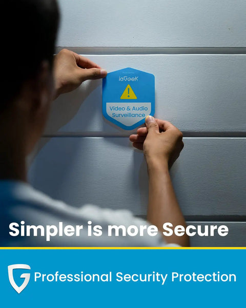 Person installing video and audio surveillance sign, emphasizing security with 'Simpler is more Secure' slogan.