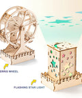 Five In One Wooden STEM Kits For Kids With Amusement Park Theme showing Ferris wheel and star nightlight models, 3D puzzle set