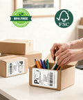 Person packing a box with 4x6 Thermal Shipping Labels 500 Per Stack With Fanfold, BPA Free, Waterproof And Oil Resistant, Clear Print.