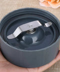 Milling Blade Replacement For Nutribullet 600W And 900W Blenders Flat Extractor Grinder Blade held in hand