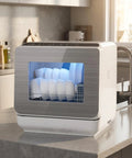 Top Tier Portable Countertop Dishwasher For Apartments And Dorms Featuring Plug And Play Setup Quick Wash Cycles Sleek Footprint And A Slick Build that shows white dishes inside.