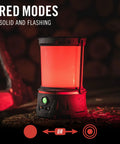 Rechargeable Emergency Camping Lantern with red flash mode and illuminated power button on wooden surface