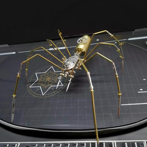 Metal Spider Model Kit For Adults With Brass Gears And Steampunk Flair A 3D Mechanical Insect Sculpture Crafted From Premium Laser Cut Steel Over 100 Parts Lets You Build In A Few Hours Dope For Gearhead Hobbyists And Great For Home Office Decor Gift - Front view of brass and steel spider model on black background.