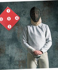Fencer beside Double-Sided Fencing Target Pro-Grade For Home Practice with wall mount and numbered red target