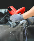 User operating the Top Shelf 1200 Watt Electric Tile Bevel Cutter for precise 45 degree cuts on tile, ideal for home upgrades.