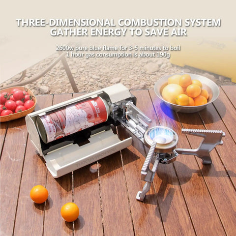 2600W Portable Gas Stove With Cassette Design And Multi Stage Adjustable Flame for camping and outdoor travel, on wooden table.