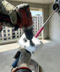 Electrician using Professional Drill Powered Wire Puller And Feeder Tool connected to a drill for conduit work.