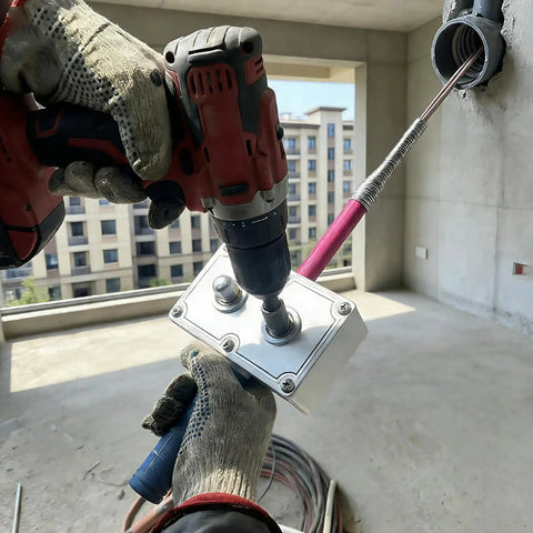 Electrician using Professional Drill Powered Wire Puller And Feeder Tool connected to a drill for conduit work.