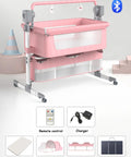 Smart Electric Baby Bedside Crib And Bluetooth Bassinet For Room Sharing With Automated Remote Control Smooth Swaying Motion And Built In Lullabies For A No Sweat Parenting Vibe Pink, featuring remote control and storage basket.