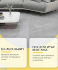 Living room with gray couch, marble coffee table, and ceramic floor tiles featuring signs promoting tile beauty and wear resistance.