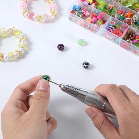 Person using 10 Pack Mini Twist Drill Bit Set 0.6mm To 2.2mm Titanium Coated High Speed Steel Micro Drill Bits for jewelry making