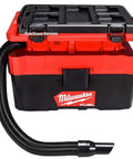 Heavy Duty 2.5 Gallon Cordless Wet And Dry Shop Vacuum Delivering 87 DB Whisper Quiet Runtime And Badass Suction For Fast Debris Clearing On Any Job Site in red and black with hose attachment.