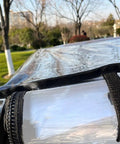 Close-up of All Weather Forklift Cab Enclosure Cover With Heavy Duty UV Protection and Waterproof Vinyl, outdoor setting.