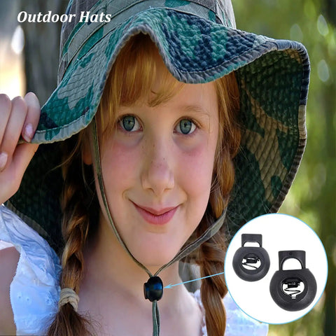 Young girl in camo hat with Forty Piece Cord Locks Set For Drawstrings Black Plastic Toggle Stoppers on chin strap