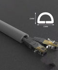 Low Profile Gray Floor Cable Cover And Durable Pvc Wire Protector With Anti Slip Cord Hider For Tight Home Office Setups with Ethernet cables.
