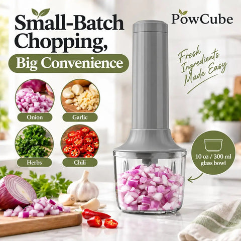 No-Fuss Cordless Hand Mixer, Kickass 4-In-1 with 10 oz glass bowl, chopped vegetables on a kitchen counter.
