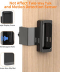 No Drill Anti Theft Video Doorbell Mount for Quick Setup in Apartments and Homes Works With Most Video Doorbells Indoors Or Outdoors Keeps Your Doorbell Safe From Theft Fits Doors From Point Six To Two Point Three Inches Thick Black shown installed on a wooden door with motion detection sensor.