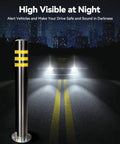Heavy Duty Stainless Steel Safety Bollard 2 Pack Rigid parking lot barrier with reflective tape illuminated at night.