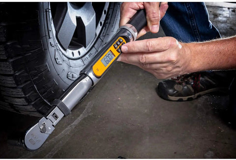 One Quarter Inch Drive 120XP Flex Head Electronic Torque Wrench With Angle Readout Pro Grade Quality In Use On Vehicle Tire