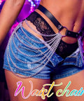 Edgy Punk Waist Chain Belt Black Leather Harness With Silver Layered Chains Snatching That Hip Curve Adjustable Fit Perfect For Dope Rave Looks And Night Out Vibes worn over denim shorts with layered chains.