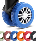 8-pack silicone luggage wheel covers for 2-2.4 in spinner wheels; blue installed, other colors shown.