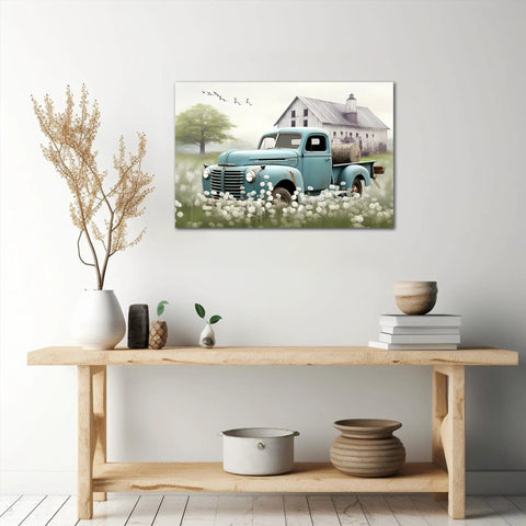 Rustic Farmhouse Truck Wall Art Canvas Print 24x36 Inches Teal Pickup Truck And White Barn Scene hung above wooden shelf