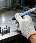 Top Shelf 1/8 Inch Pencil Air Die Grinder in hand, used for deburring and grinding on metal work.
