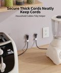 Magnetic Cable Clips Cord Organizer Set for Desk and Office securing power cords on kitchen counter near appliances.