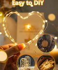Close-up of 4 Pack 100 LED Fairy Lights Battery Operated With Remote 33Ft Waterproof Twinkle String Lights heart shape DIY