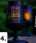 Solar Insect Killer Torch Bug Zapper And Accent Light For Patio Outdoor Pest Control with Flickering Flame LED displayed on tabletop