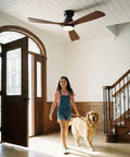 52 Inch Smart Flush Mount Low Profile Outdoor Ceiling Fan With Lights Dope Quiet DC Motor Alexa Built In App Remote Control Six Speed Dimmable Three Wood Blades For Patio Dark Walnut installed in a room.